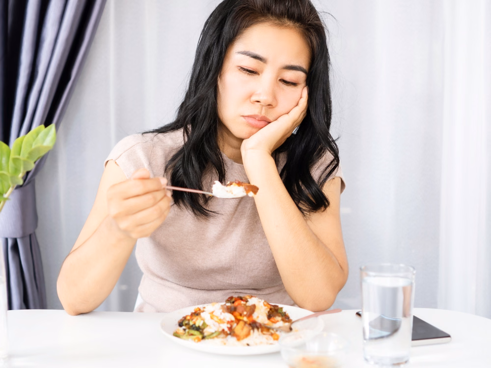 Hình ảnh các triệu chứng khó tiêu đầy hơi buồn nôn và ợ nóng ở người mắc rối loạn tiêu hóa