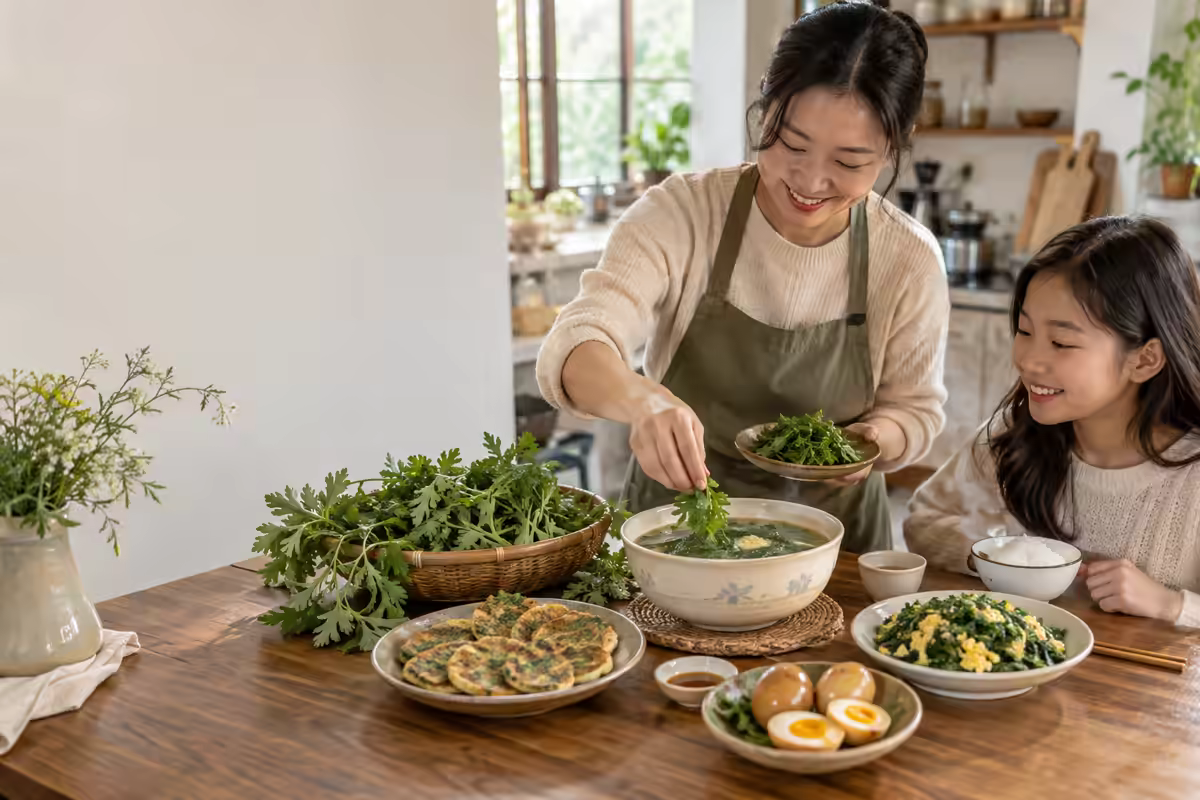 Gia đình chế biến món ăn từ ngải cứu trong căn bếp Việt