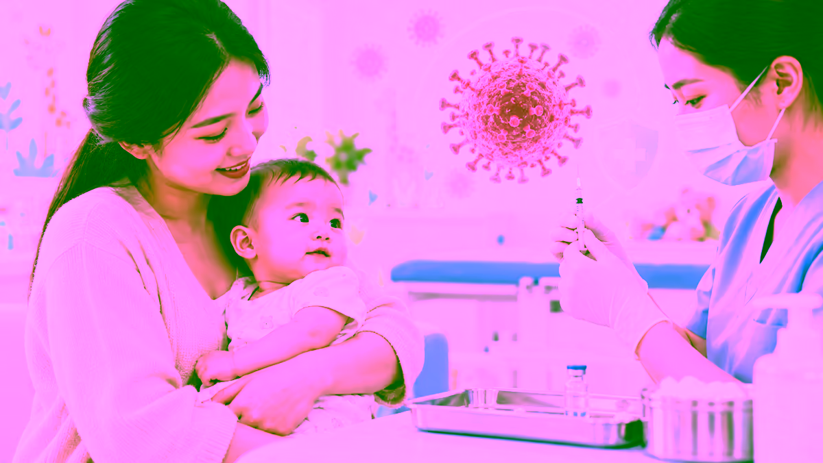 Bác sĩ chuẩn bị tiêm vắc xin cho trẻ nhỏ để phòng bệnh sởi